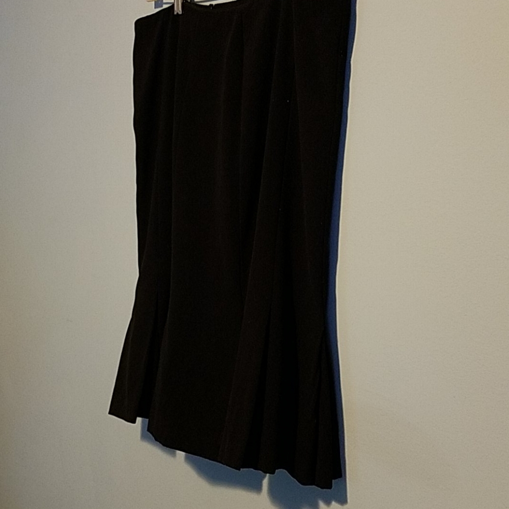 Like new black skirt. Pleats on bottom